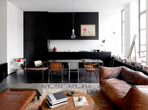 Interior: Black kitchen, Brown sofa