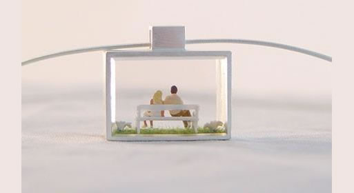 young couple on bench pendant designed by anne gericke