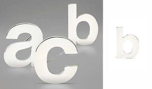 Helvetica Brooches